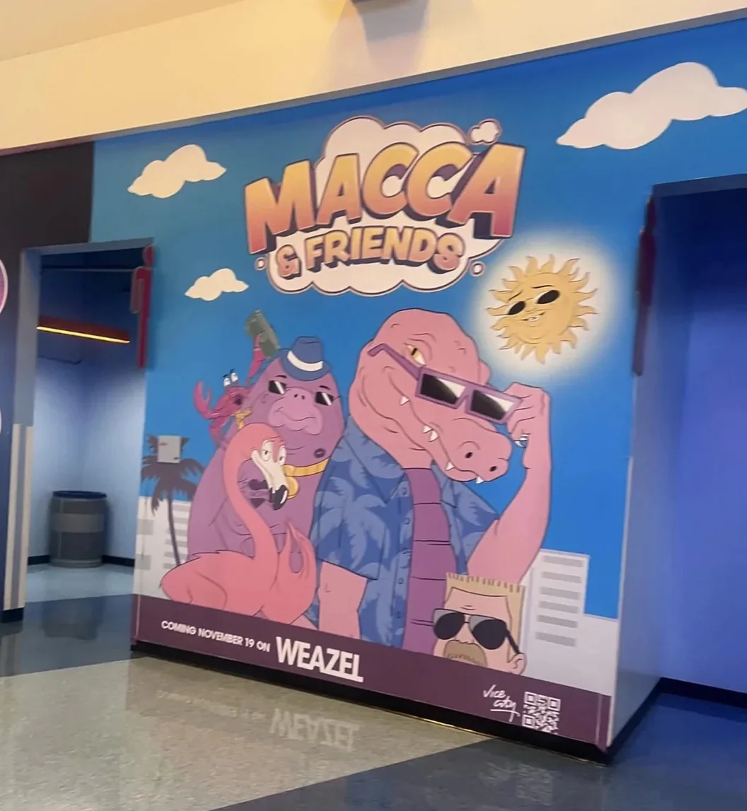 A Macca and Friends cartoon mural at the Kaseya Center announcing November 19 on Weazel