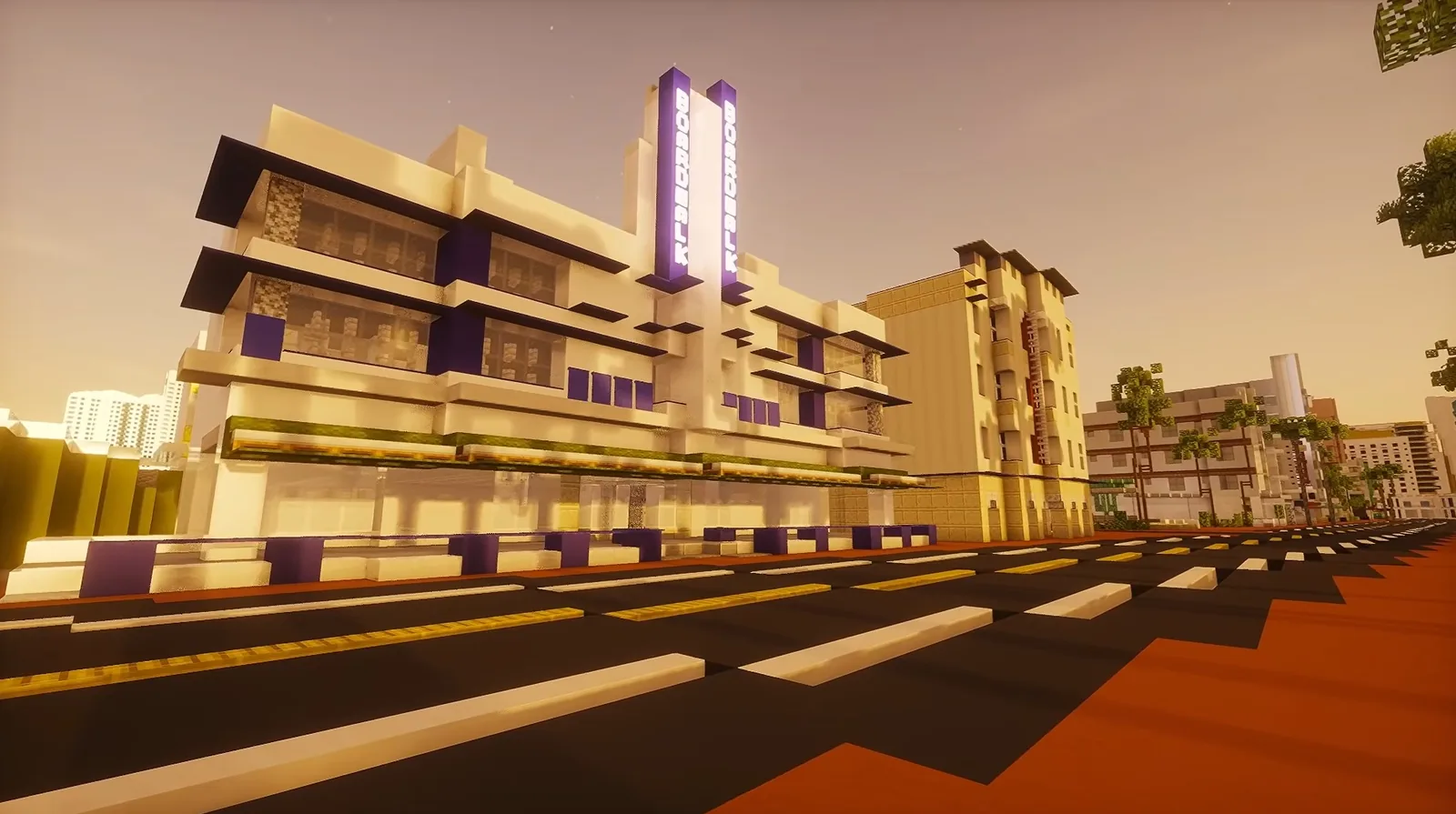 Art deco hotels of Ocean Drive rebuilt in Minecraft under a sunset sky