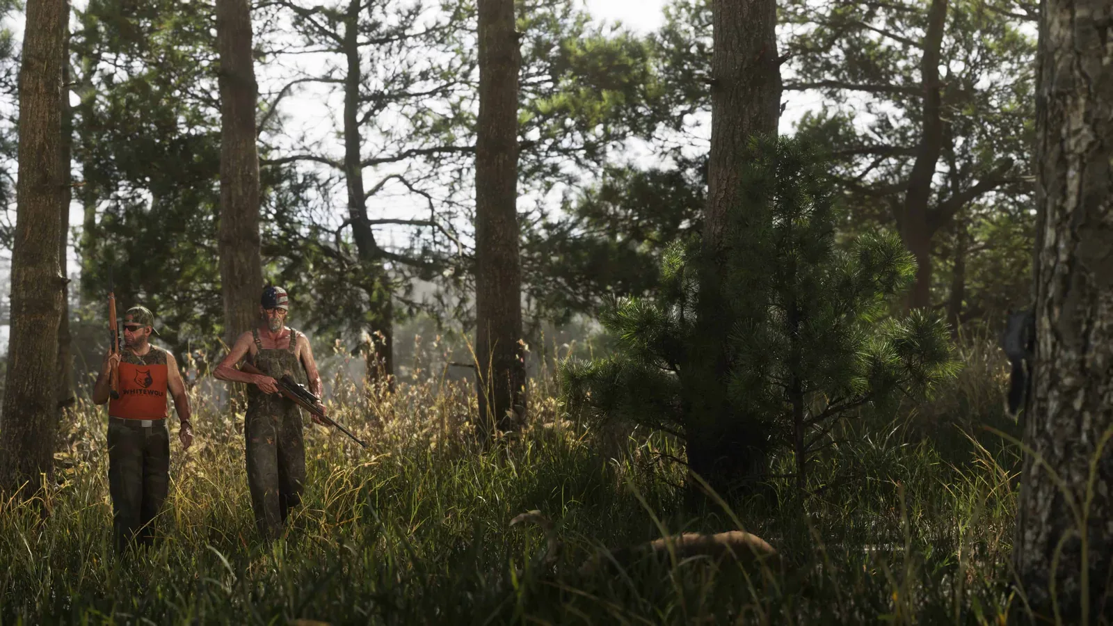 Two camouflaged hunters walking through tall grass and pines in Mount Kalaga