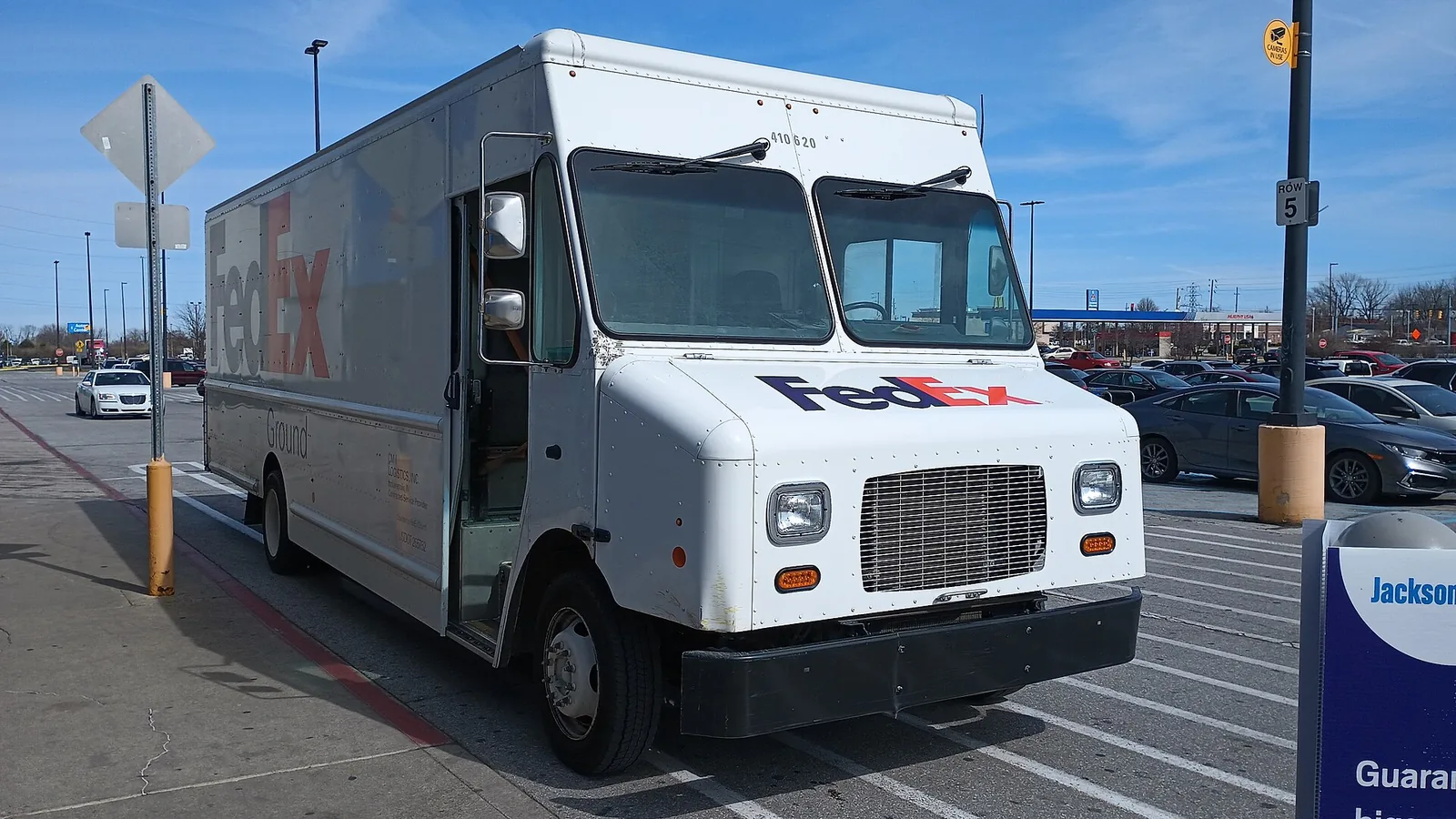 White multi-stop step van delivery truck